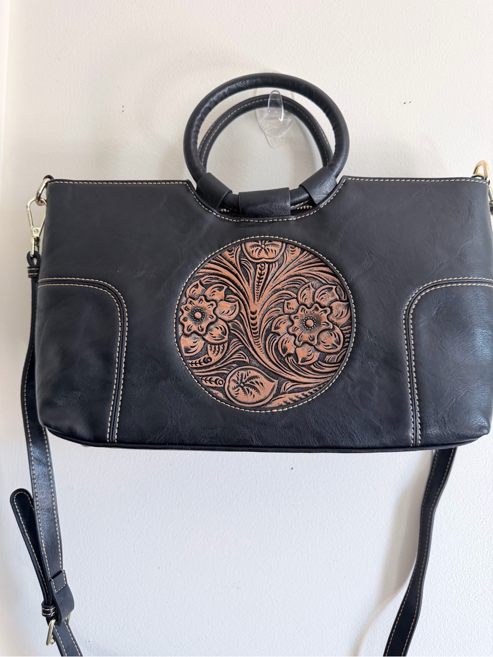 Black Shoulder Tote with Embossed Brown Floral Medallion